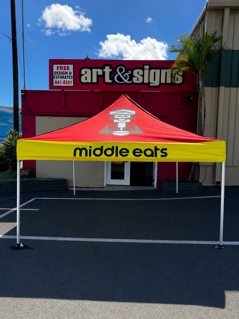 Middle Eats printed pop-up canopy tent outside the Art & Signs shop