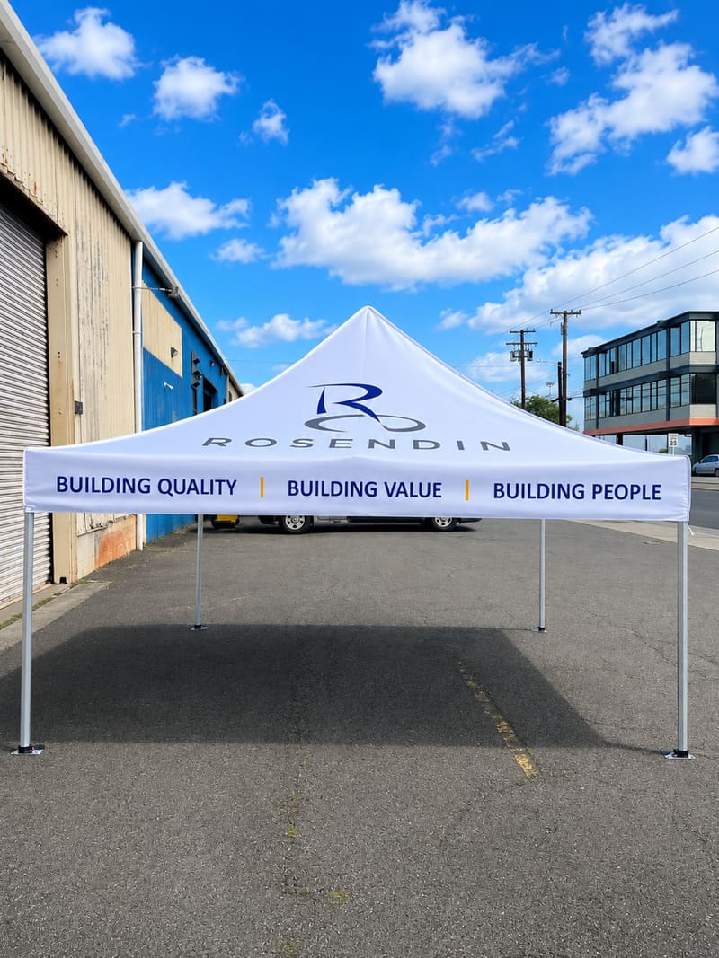 Rosendin branded pop-up canopy tent with valance lettering