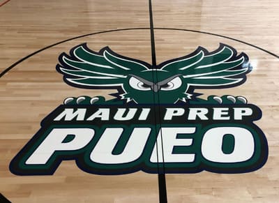 Maui Preparatory Academy Pueo owl logo painted at center court