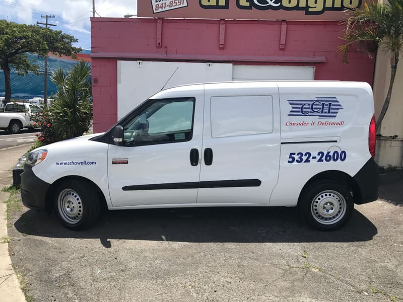 CCH cargo van lettered with a cut-vinyl logo and phone number
