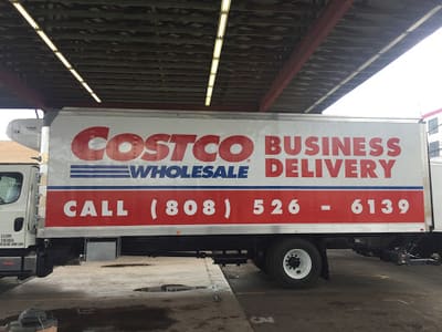 Costco Wholesale Business Delivery box truck lettered with logo and phone number