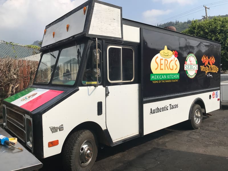 Serg's Mexican Kitchen food truck with logo and lettering