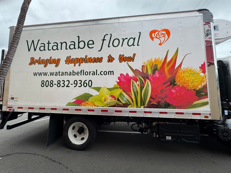 Watanabe Floral delivery truck wrapped with tropical flower photography