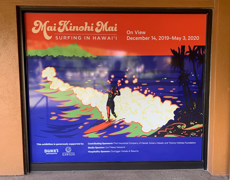 Framed exhibit graphic for Mai Kinohi Mai: Surfing in Hawaii at Bishop Museum